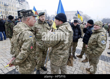 Kiev, Ukraine. 18th Feb, 2017. Ukrainian soldiers attend a gathering to marking the second anniversary of the fight near Debaltsevo, at Sophia Square in Kiev, Ukraine, on February 18, 2017. Credit: Serg Glovny/ZUMA Wire/Alamy Live News Stock Photo