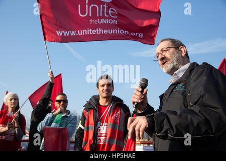 London, UK. 18th February, 2017. Richard Allday, National Executive Council member at Unite the Union, addresses striking British Airways mixed fleet cabin crew protesting at Hatton Cross near Heathrow airport. The current strike, part of a long-running pay dispute, will run from 17th-20th February and further days of industrial action have been scheduled. Credit: Mark Kerrison/Alamy Live News Stock Photo