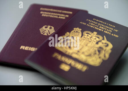 Berlin, Germany. 06th July, 2016. A British (R) and a German passport, seen in Berlin, Germany, 06 July 2016. Photo: Britta Pedersen/dpa | usage worldwide/dpa/Alamy Live News Stock Photo