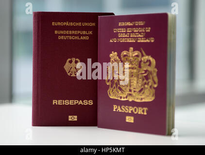 Berlin, Germany. 06th July, 2016. A British (R) and a German passport, seen in Berlin, Germany, 06 July 2016. Photo: Britta Pedersen/dpa | usage worldwide/dpa/Alamy Live News Stock Photo