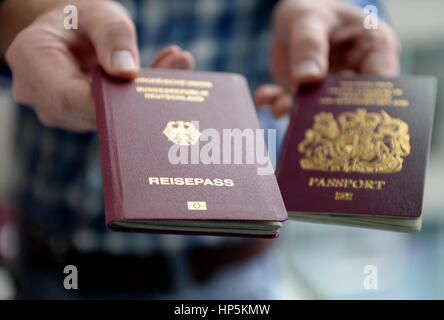 Berlin, Germany. 06th July, 2016. A British (R) and a German passport, seen in Berlin, Germany, 06 July 2016. Photo: Britta Pedersen/dpa | usage worldwide/dpa/Alamy Live News Stock Photo