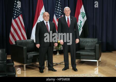 Munich, Germany. 18th Feb, 2017. U.S. Vice President Mike Pence with Iraqi Prime Minister Haider al-Abadi on the sidelines of the Munich Security Conference February 18, 2017 in Munich, Germany. Pence later told the European allies that 'the United States of America strongly supports NATO and will be unwavering in our commitment to this trans-Atlantic alliance.' Credit: Planetpix/Alamy Live News Stock Photo