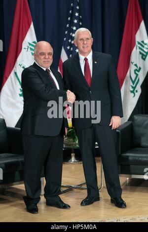 Munich, Germany. 18th Feb, 2017. U.S. Vice President Mike Pence greets Iraqi Prime Minister Haider al-Abadi on the sidelines of the Munich Security Conference February 18, 2017 in Munich, Germany. Pence later told the European allies that 'the United States of America strongly supports NATO and will be unwavering in our commitment to this trans-Atlantic alliance.' Credit: Planetpix/Alamy Live News Stock Photo