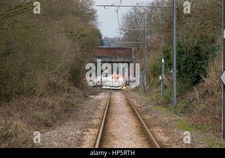 Morden Hall Park, London, UK. 19th February 2017. Wimbledon to Mitcham tram is closed for several days as planned major track maintenance and engineering underway at Morden Road Station. Credit: Malcolm Park editorial/Alamy Live News. Stock Photo