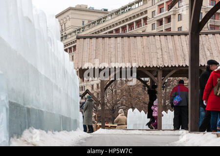 Moscow, Russia. Sunday, Feb. 19, 2017. Details of snow fortress and decorations on Revolution square - the main area of the festival. Maslenitsa, pancake, cheese fare week festival, carnival started in the city. People enjoy street performances and eat hot pancakes. This is also farewell to winter festival. The day is warm (+2C, about 36F) but gloomy. © Alex's Pictures/Alamy Live News Stock Photo