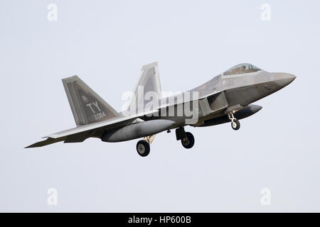 USAF F-22A Raptor catching the crosswind during an Approach to RAF Lakenheath. 95th FS F-22's were deployed to the UK as part of Exercise Rapid Raptor Stock Photo