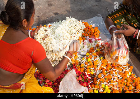 Garlands,of,flowers,petals,for,sale,flower,market,Hogg Market,for,religious,offerings,Kolkata,Calcutta,West Bengal,West,Bengal,India,Indian,Asia,Asian Stock Photo