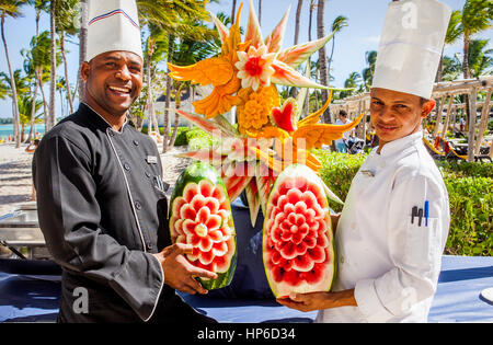 Cooks and fruit ornamentation, Barcelo Bavaro Beach Resort, Punta Cana, Dominican Republic Stock Photo