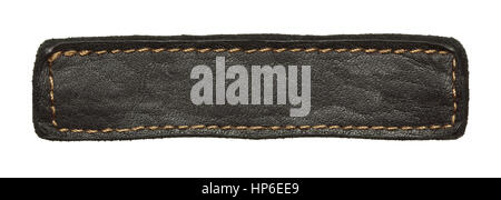 Black leather jeans label. Isolated long tag with stitches. Stock Photo