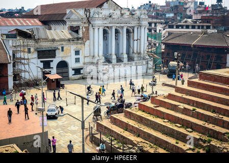 Crowd walking on the plaza in front of the white building with European architectural style called Gaddi Baithak. Kathmandu, Nepal. Stock Photo