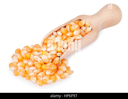 Dried corn kernels in wooden scoop isolated on white background. Corn seed in scoop on white background Stock Photo