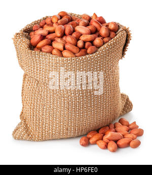 Peanut or groundnut in burlap bag with heap isolated on white background. Peanut in sack on white background. Full burlap bag of peanuts Stock Photo