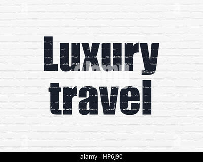 Vacation concept: Painted black text Luxury Travel on White Brick wall background Stock Photo
