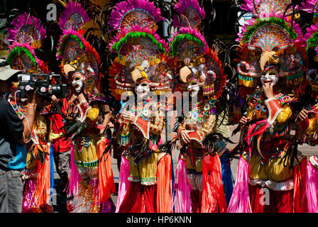 Masskara Festival street dance parade participant facing the video camera. Stock Photo