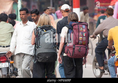 young,tourists,in,India,female,women,student,students,gap,year,backpackers,backpacking,Varanasi,India,Indian,Asia,Asian, Stock Photo