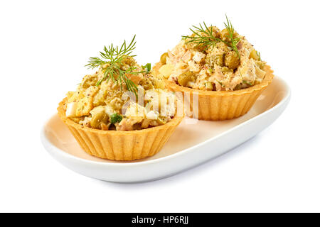 Two tartlets with ham salad on white Stock Photo