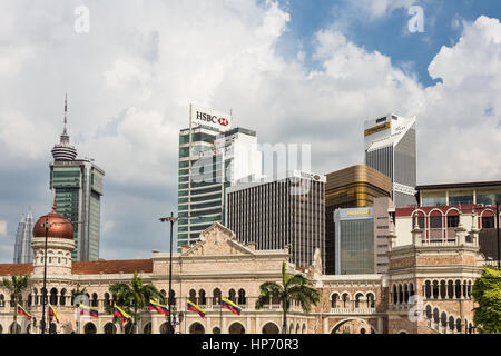 KUALA LUMPUR, MALAYSIA - JANUARY 14, 2017: The traditional architecture of the Sultan Abdul Samad building contrasts with modern towers in Kuala Lumpu Stock Photo