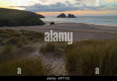 Sun going down over Holywell Bay in North Cornwall Stock Photo