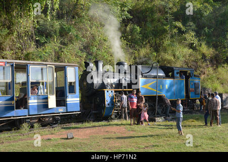 Mettupalayam, India - October 29, 2015 - Tourists in front of famous toy train in Unesco World heritage Stock Photo