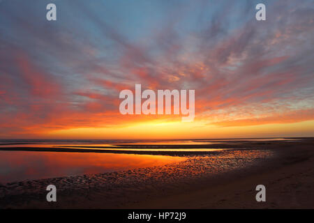 Sunrise along the north Norfolk coast at the beach by Burnham Overy Dunes in June Stock Photo