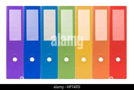 colorful ring binders-full with office document and business information on a white background Stock Photo