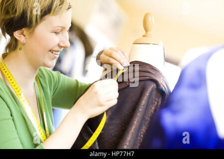Model released, Junge Schneiderin - dressmaker Stock Photo