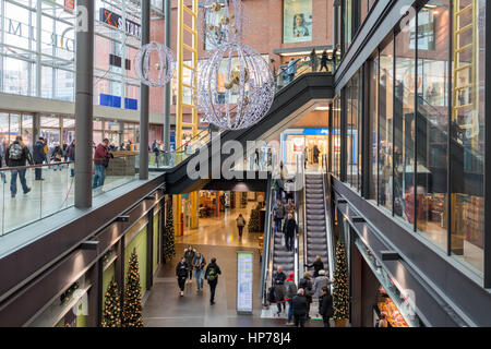 DUISBURG, GERMANY - DECEMBER 17, 2016: Unknown people in shopping mall 'Forum'  in Duisburg, Germany Stock Photo