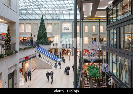 DUISBURG, GERMANY - DECEMBER 17, 2016: Unknown people in shopping mall 'Forum'  in Duisburg, Germany Stock Photo