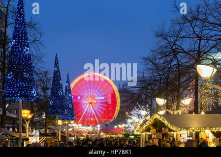 DUISBURG, GERMANY - DECEMBER 17, 2016: Traditional christmas market with illuminated ferris wheel in the center of Duisburg, Germany Stock Photo