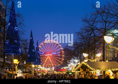 DUISBURG, GERMANY - DECEMBER 17, 2016: Traditional christmas market with illuminated ferris wheel in the center of Duisburg, Germany Stock Photo