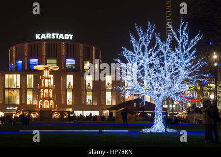 DUISBURG, GERMANY - DECEMBER 17, 2016: Traditional christmas market with illuminated tree in the center of Duisburg, Germany Stock Photo