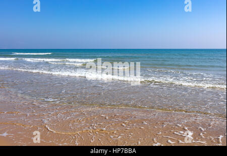 Mediterranean coast just to go for a walk listening the waves and feeling the sun Stock Photo
