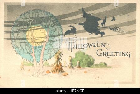 Halloween Greeting card, with Full Moon, Witch on a broom, Flying Bats, arched Black cat, and corn stalks.  1915 - 1930s   To see my related  vintage images -- in Search:  Prestor  vintage  holiday  vehicle Stock Photo