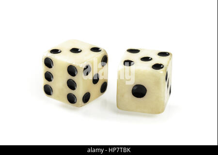 two old plastic dice isolated on white background Stock Photo