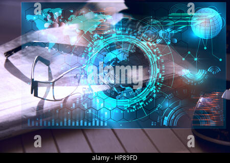 Modern business workflow with glasess,digital computer, newspapers stock market charts business,forex background,HUD virtual interface display concept Stock Photo