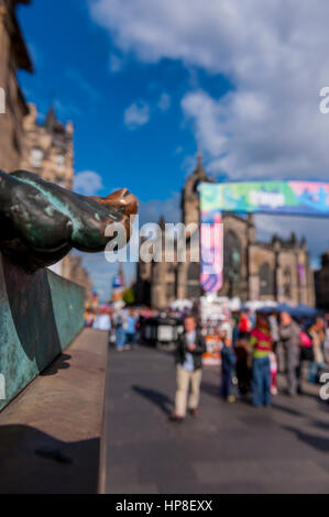 The big toe of the statue to Hume located in the High street Edinburgh during the Edinburgh festival. Stock Photo