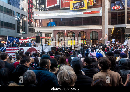 New York City, USA. 19th February, 2017. Protestors at the “I Too Am A Muslim” rally in Times Square. The event was organized to show solidarity with Muslims and protest the policies of President Trump’s administration. Credit: Ward Pettibone/Alamy Live News. Stock Photo