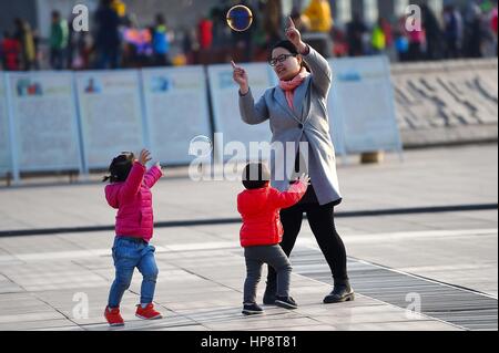Weifang, China. 19th Feb, 2017. .As spring approaches, many people go out to enjoy themselves in the open air in Weifang, east China's Shandong Province. Credit: SIPA Asia/ZUMA Wire/Alamy Live News Stock Photo