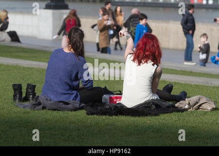 London, UK. 20th Feb, 2017. People enjoy the warm weather on London Riverside as temperatures are forecast to rise to 17 degrees Credit: amer ghazzal/Alamy Live News Stock Photo
