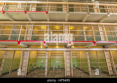 San Francisco, California, United States - August 14, 2016: interior of Alcatraz main room upper cells on three levels. All the cells are single for t Stock Photo