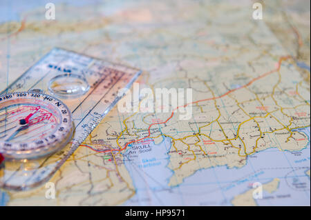 Silva compass lies on a map of Ireland. Stock Photo