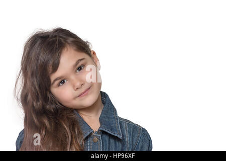 Portrait of cool long haired brunette little girl isolated on the white background. Free place for your text is in the right side of the photo. Stock Photo