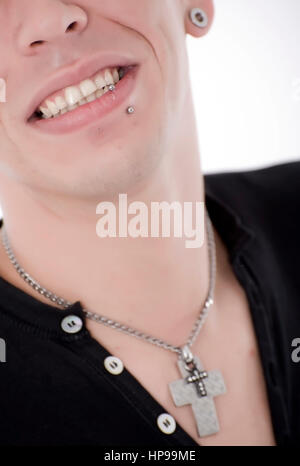 Model released , Junger Mann, 27, mit Gesichtspiercings - man with face piercings Stock Photo