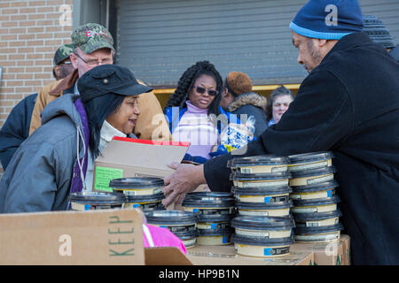 Flint, Michigan - The Muslim Food Pantry. Twice a month, members of Flint's Muslim community distribute free food to anyone who needs it. Stock Photo