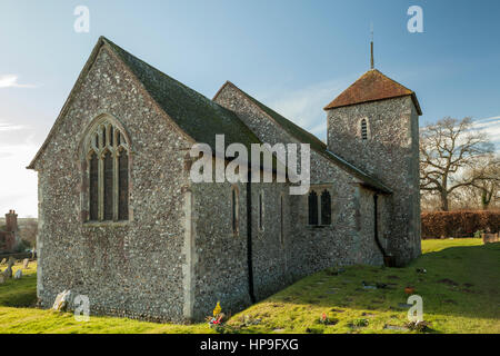 Sunny winter day at St Mary's church in Clapham village, West Sussex, England. South Downs National Park. Stock Photo