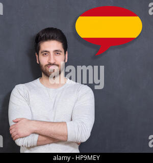 Man learn speaking spanish  in bubble Stock Photo