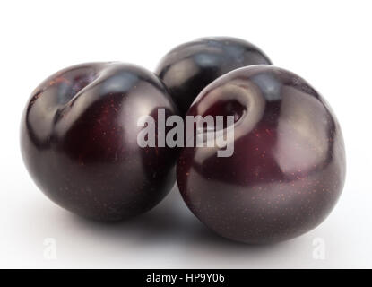 Ripe blue plums isolated on white background Stock Photo