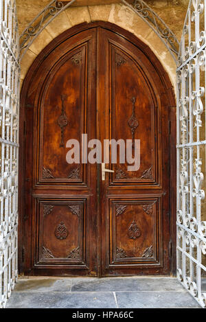 Ancient wooden door in Old city, Icheri Sheher at Baku, Azerbaijan. Stock Photo