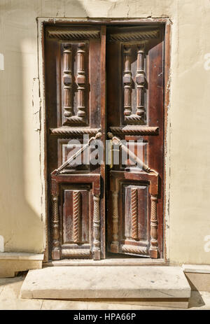 Ancient wooden door in Old city, Icheri Sheher at Baku, Azerbaijan. Stock Photo