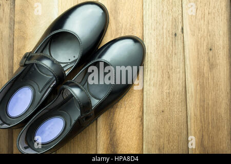 Thai girl Student shoes at concrete background Stock Photo